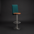 Tall host stool with a steel base and Deep Green upholstered back