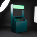 Branded kiosk with an illuminated Modern Green header and a touchscreen