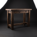 Set-dressing console table hand-built from reclaimed barn timber